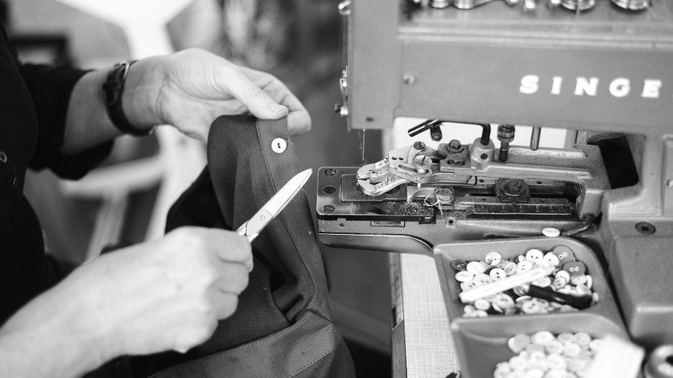 underpants getting sewn by hand